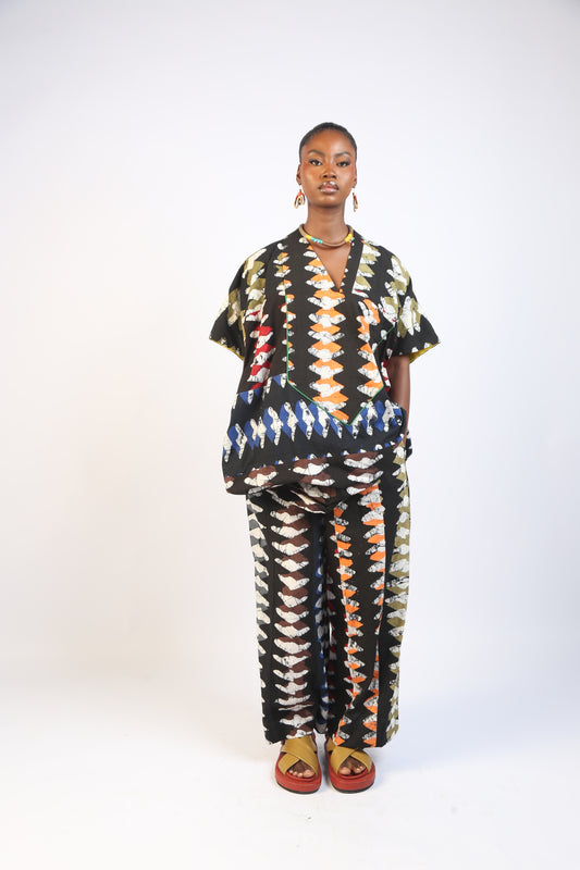 MULTICOLOURED WHITE AND BLACK DIAMOND PRINT PANTS