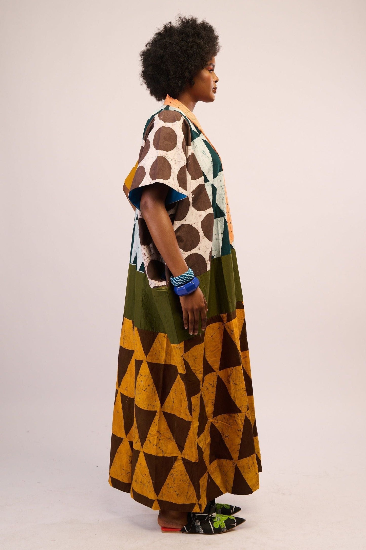 BRIGHT MULTICOLOURED AGBADA WITH YELLOW AND BROWN BOTTOM AND PEACH ASOOKE WITH HOLES