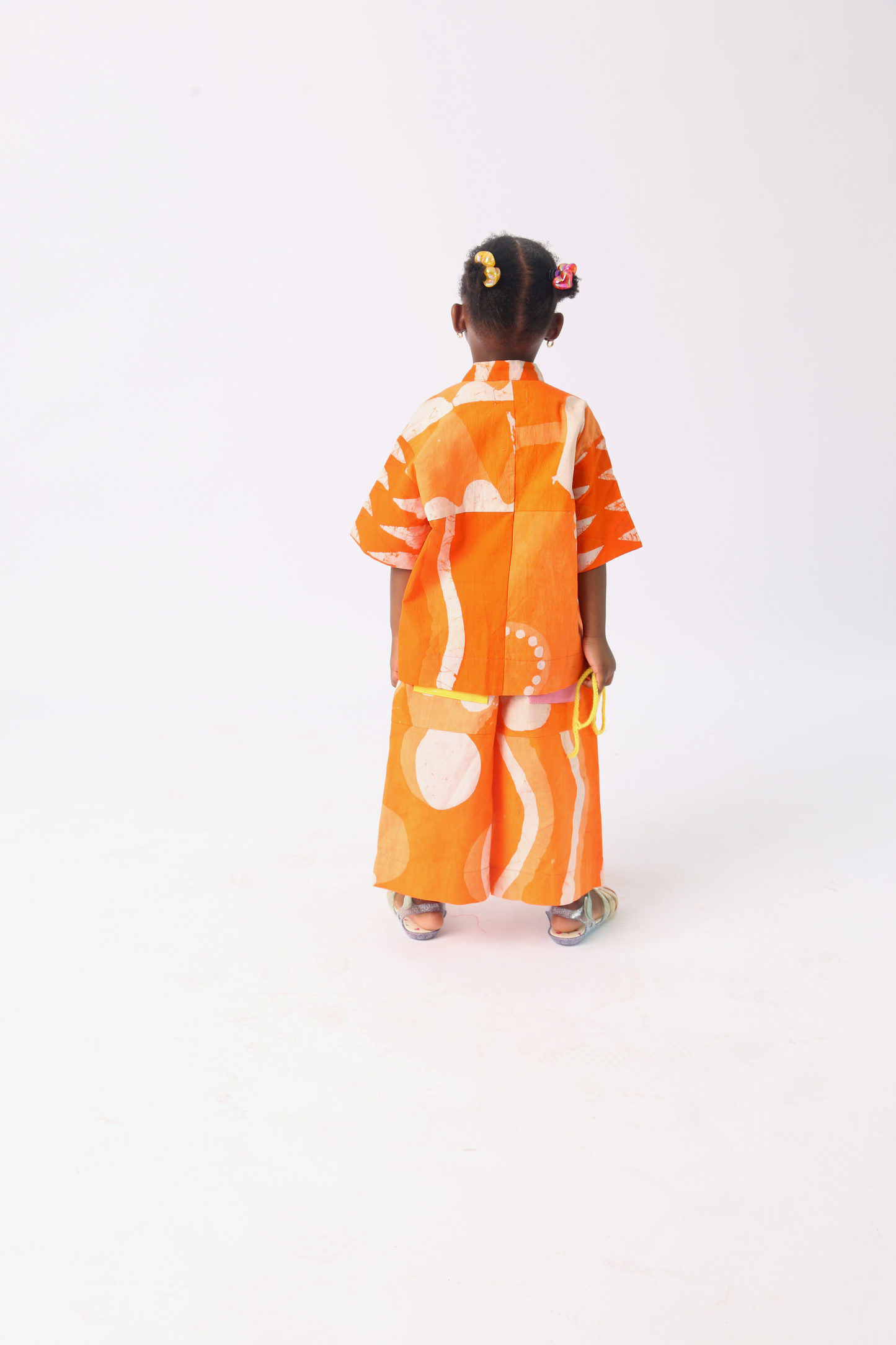 KIDS WHITE AND TANGERINE MULTIPRINT CULOTTES