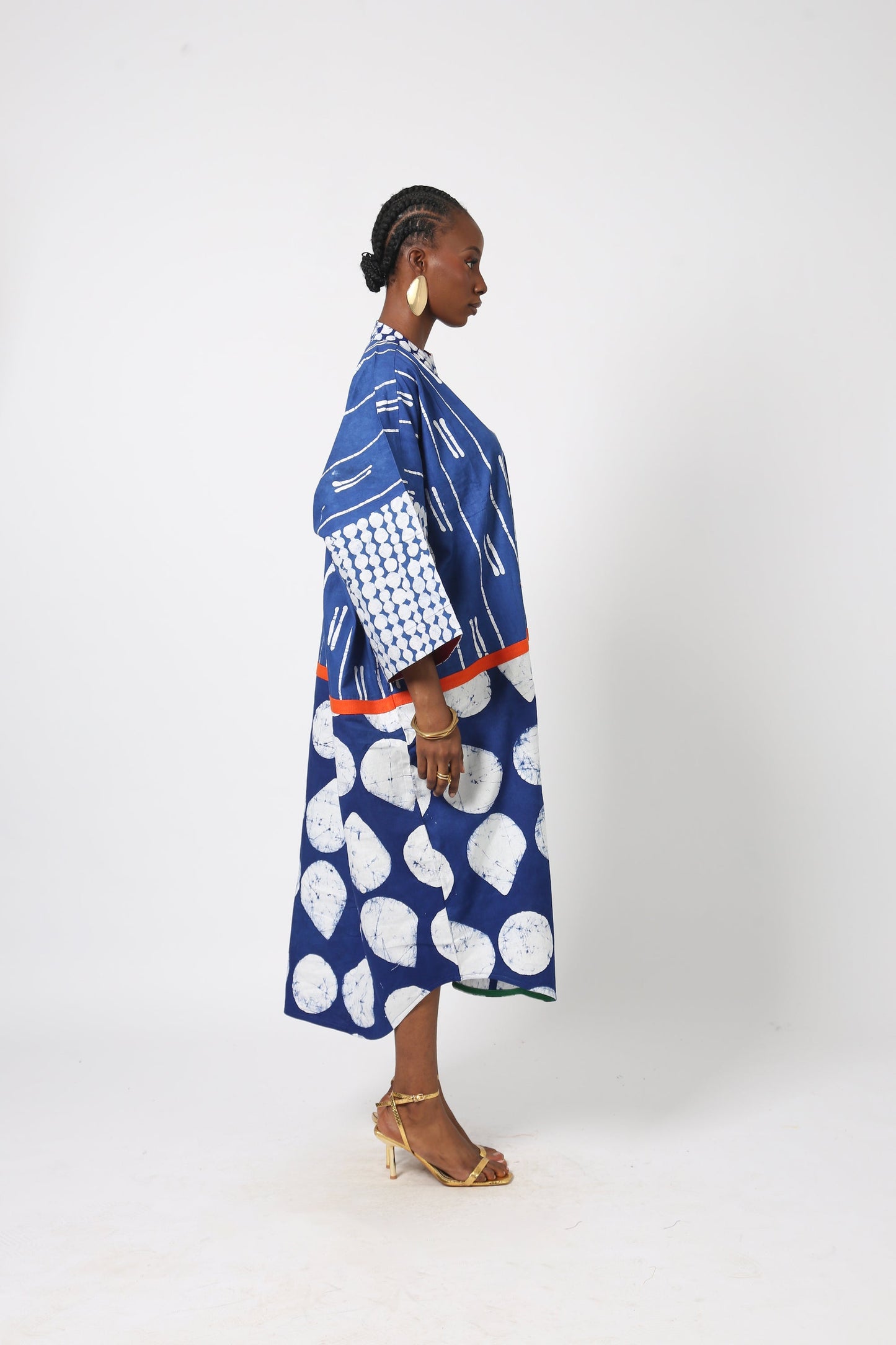 BLUE AND WHITE MULTIPRINT KAFTAN WITH ORANGE ASO OKE OUTLINE
