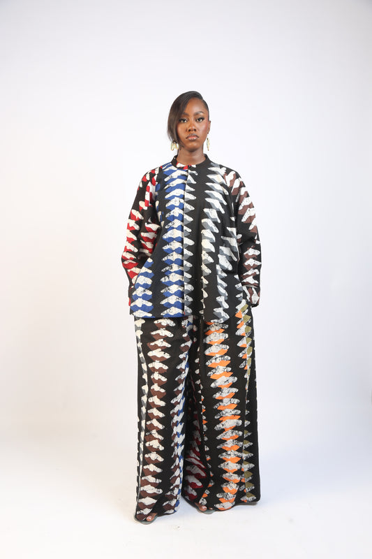 MULTICOLOURED WHITE AND BLACK DIAMOND PRINT PANTS