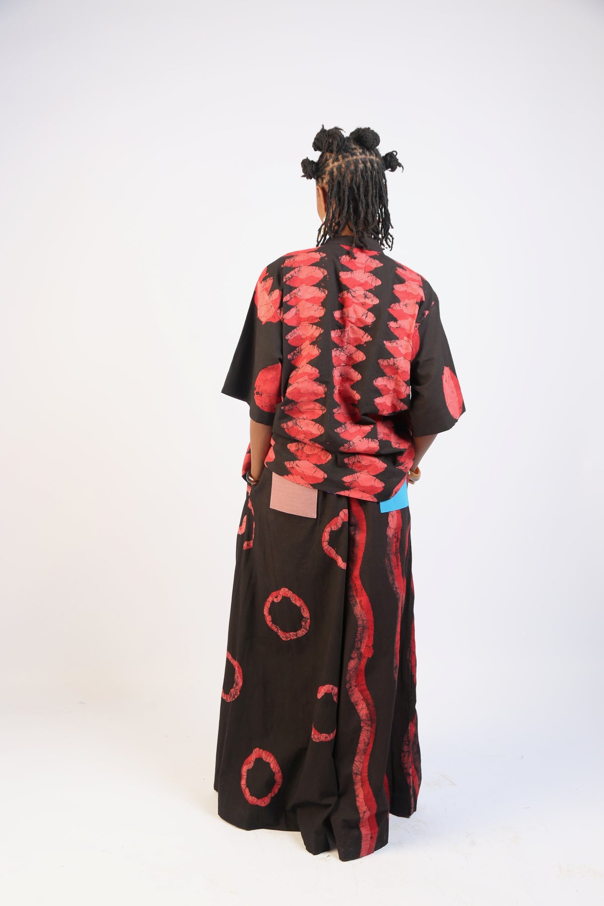 CORAL, RED AND BLACK MULTIPRINT PANTS