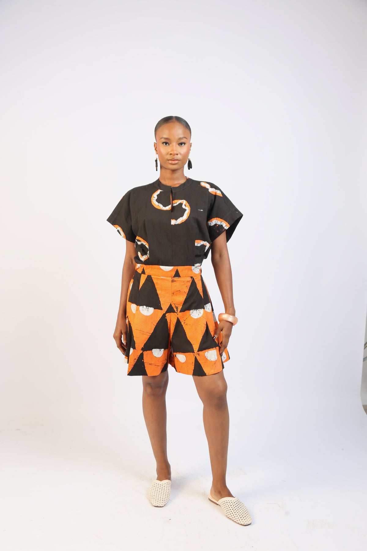 WHITE,TANGERINE AND BLACK MULTIPRINT PLAYSUIT