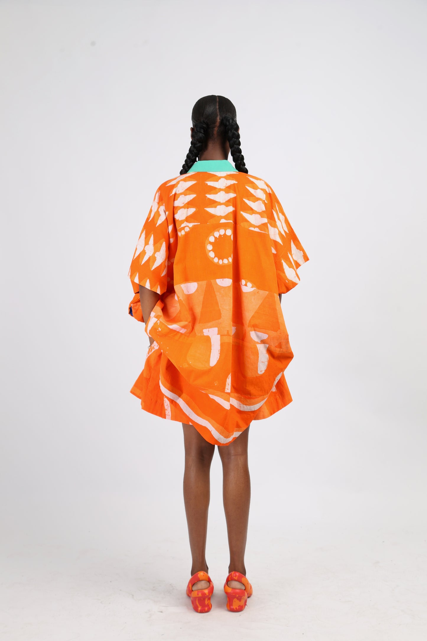 WHITE AND TANGERINE MULTIPRINT WIDE LEG SHORTS