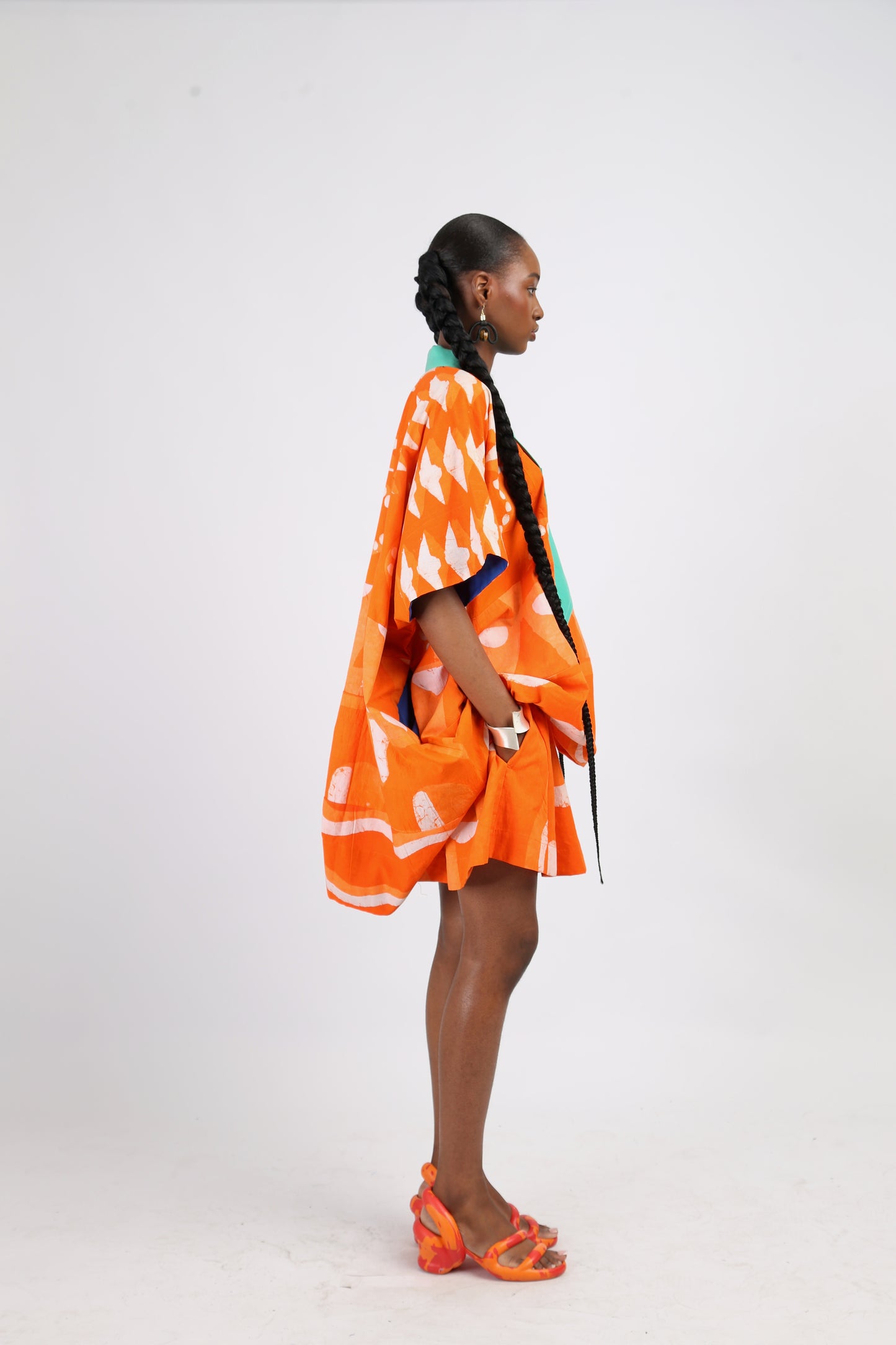 WHITE AND TANGERINE MULTIPRINT WIDE LEG SHORTS