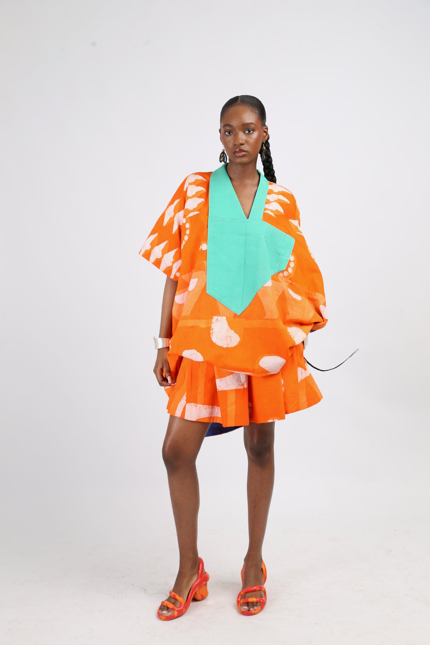 WHITE AND TANGERINE MULTIPRINT WIDE LEG SHORTS