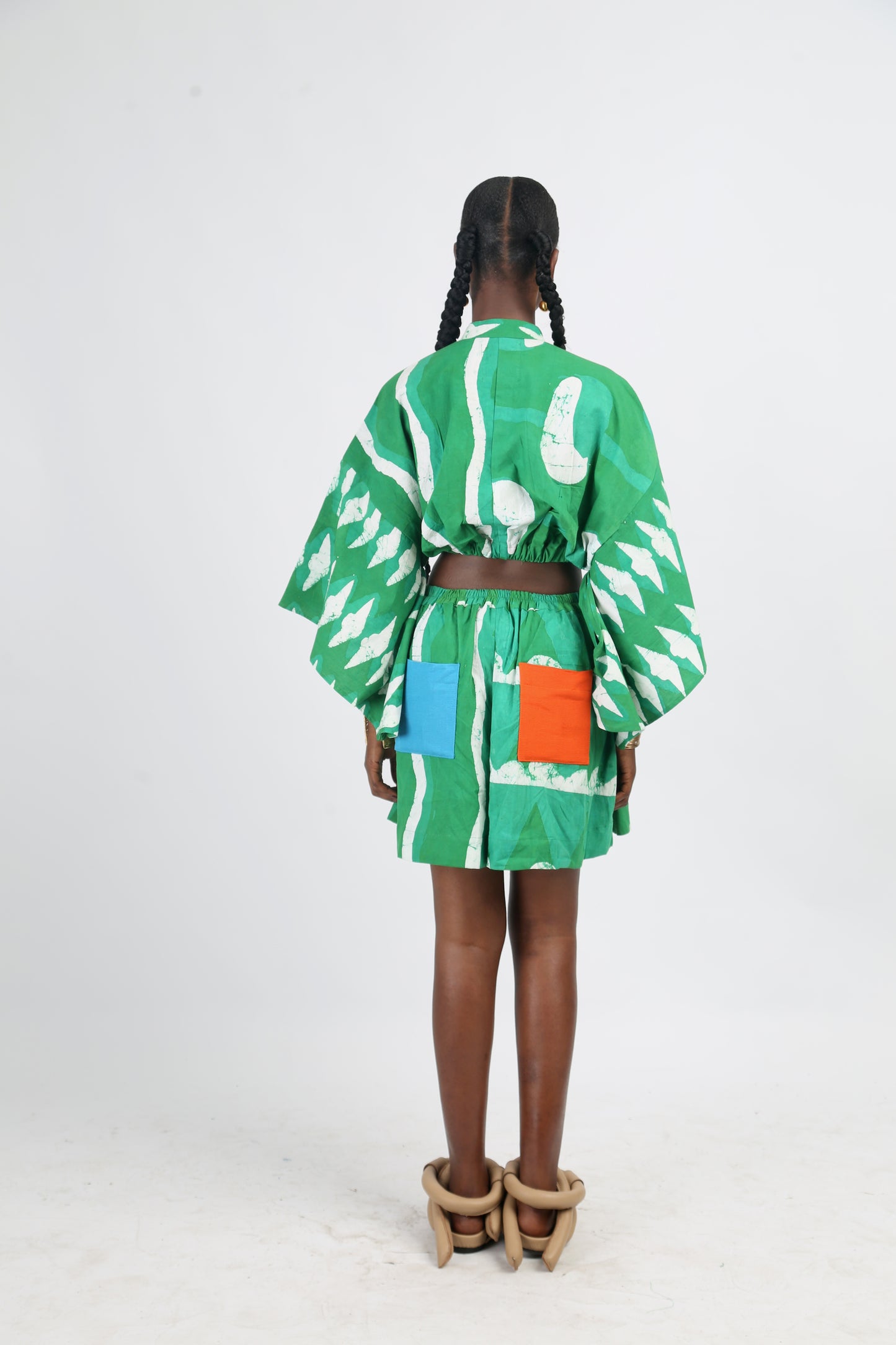 WHITE AND GREEN MULTIPRINT SHORTS