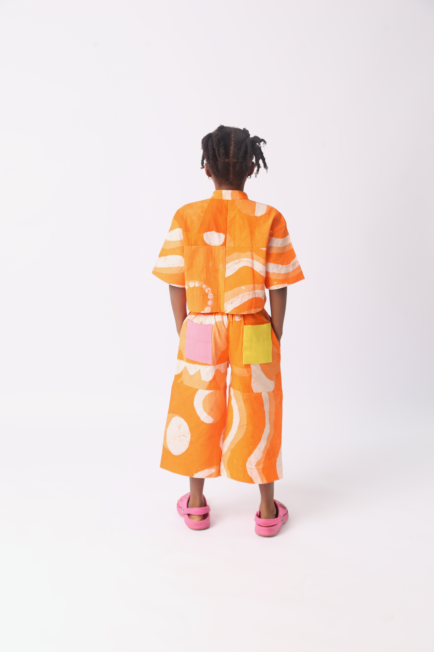 KIDS WHITE AND TANGERINE MULTIPRINT CULOTTES