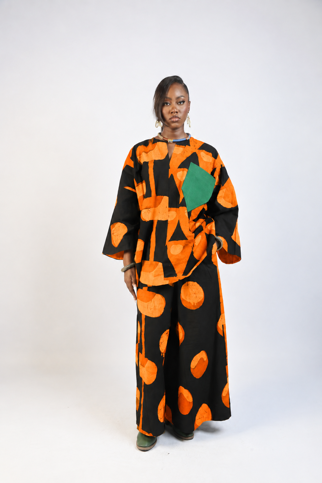 TANGERINE AND BLACK MULTIPRINT PANTS